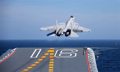 J-15t Carrier Fighter Jet taking off from an aircraft carrier